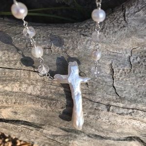 Handmade freshwater pearl and rose quartz cross necklace.